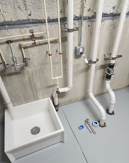 Plumbing Pipes and Sink Setup for Water Heater Repair